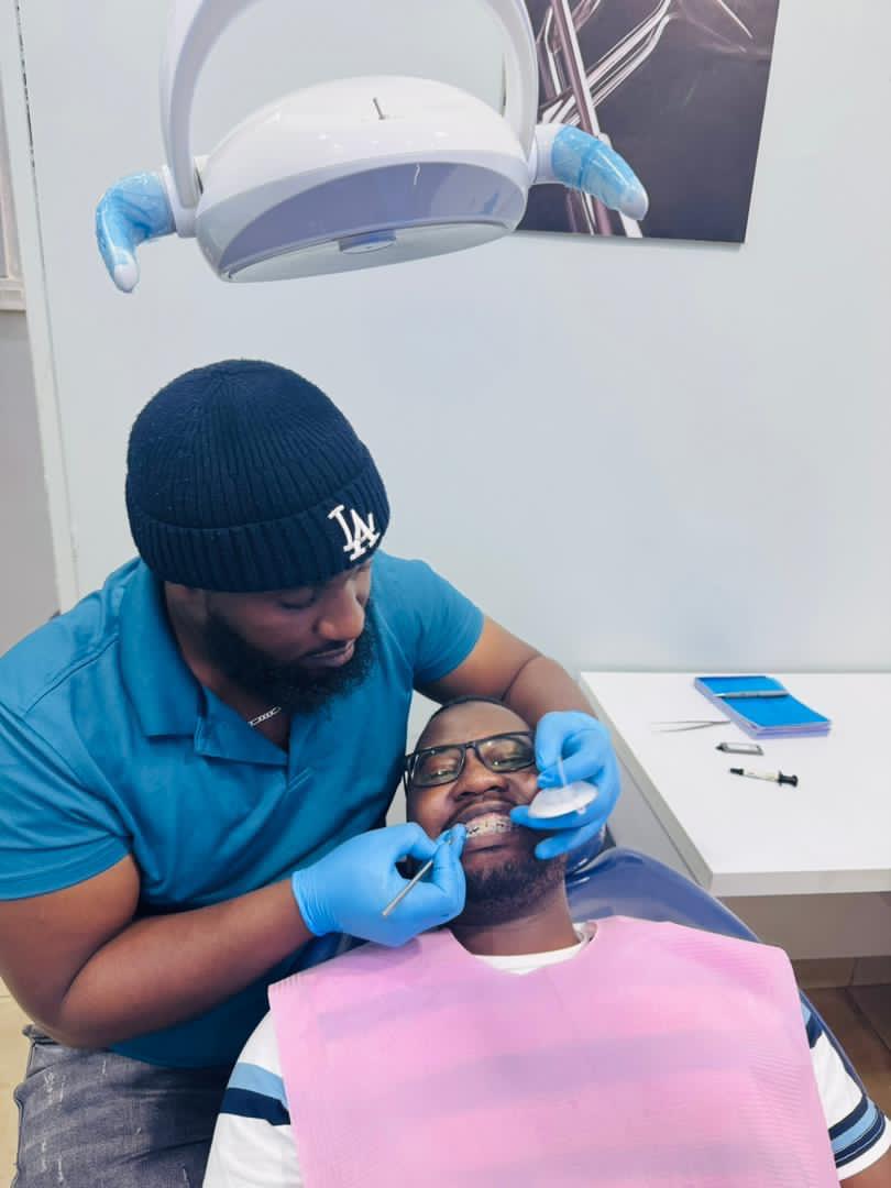 Dentist performing cosmetic and restorative treatment at La Bouche Dental Clinic