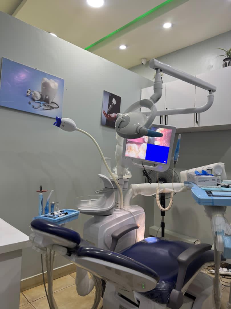 Treatment room and dental chair at La Bouche Dental Clinic